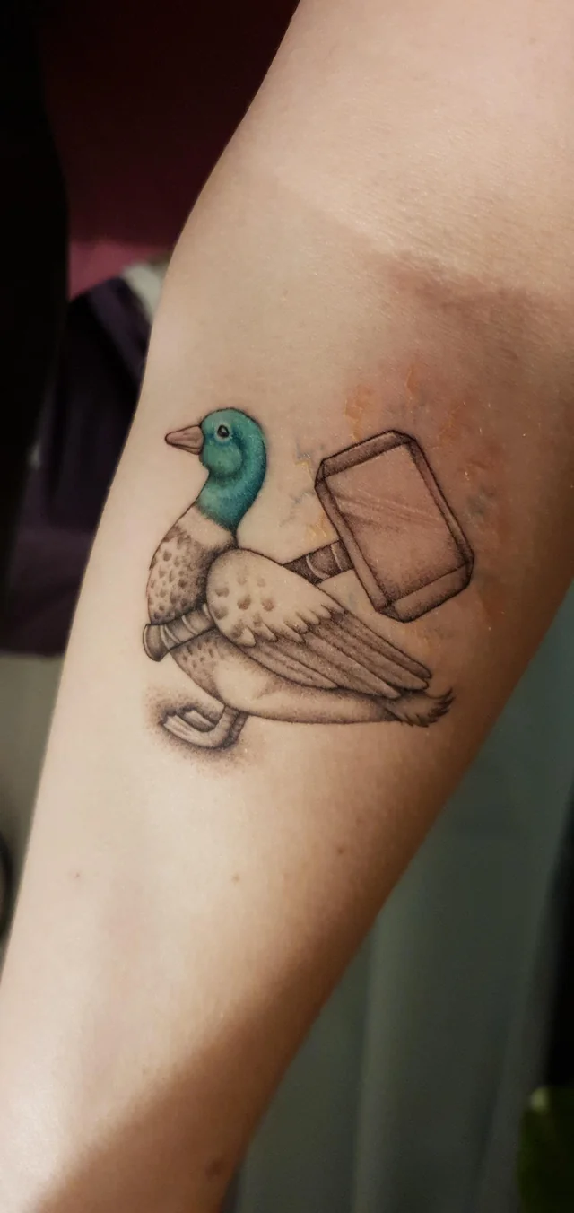 duck with knife tattoo