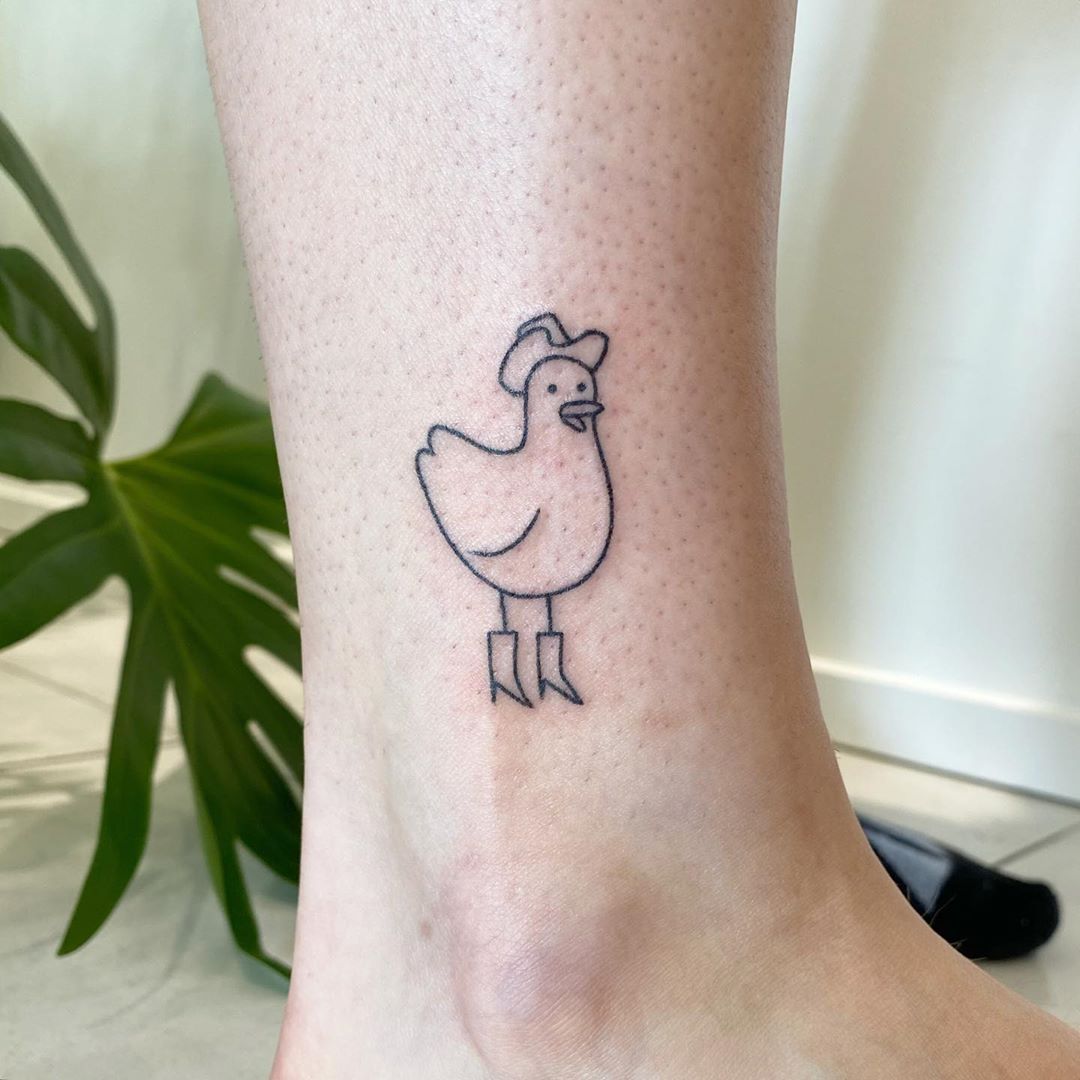 duck with knife tattoo